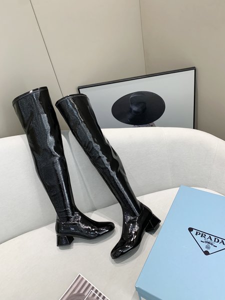 Prada Patent leather boots with sheepskin lining