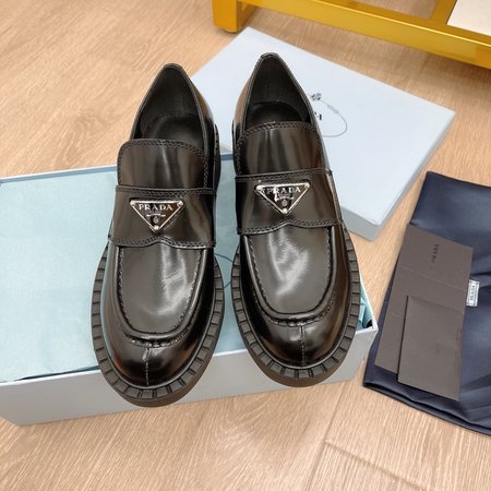 Prada Triangular buckle platform loafers