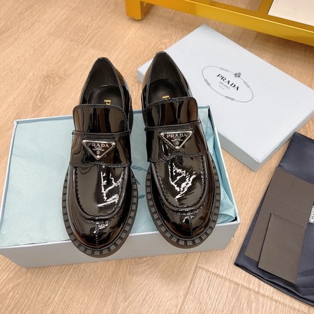 Prada Triangular buckle platform loafers