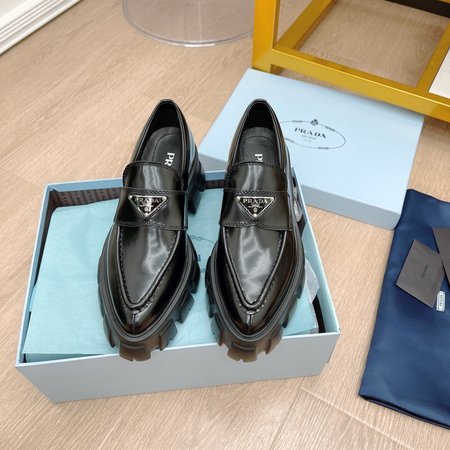 Prada Triangular buckle platform loafers