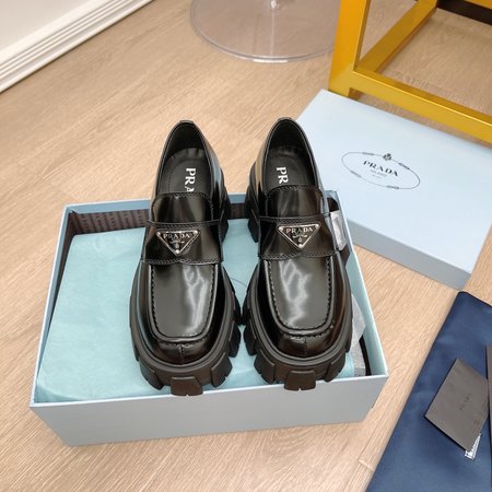 Prada Triangular buckle platform loafers