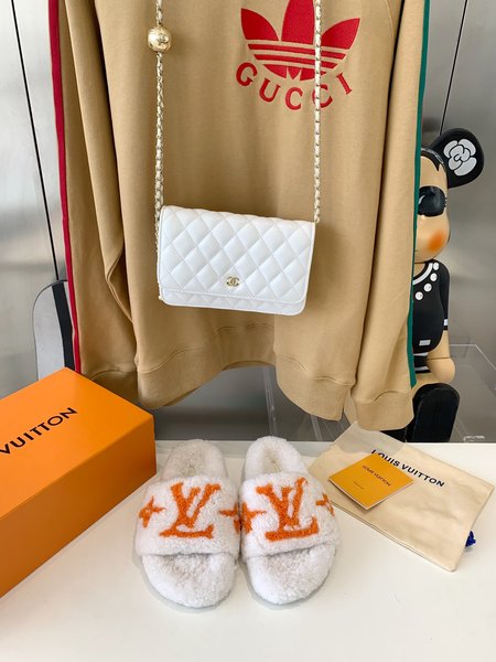 Louis Vuitton teddy fur slippers