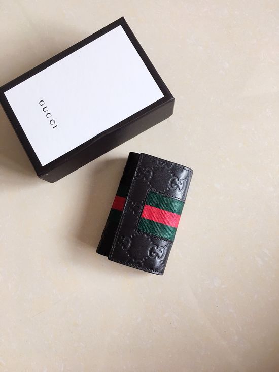 Gucci Key Holder Embossed Leather Signature Web Stripe 408828