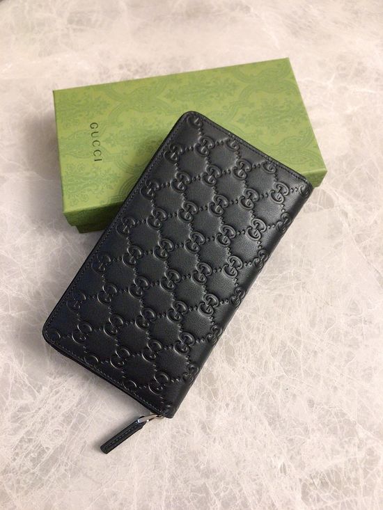 Gucci Classic Embossed G Zip Wallet 233194