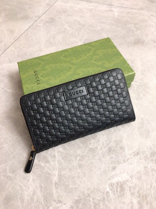 Gucci G Embossed Leather Zip Wallet 449391