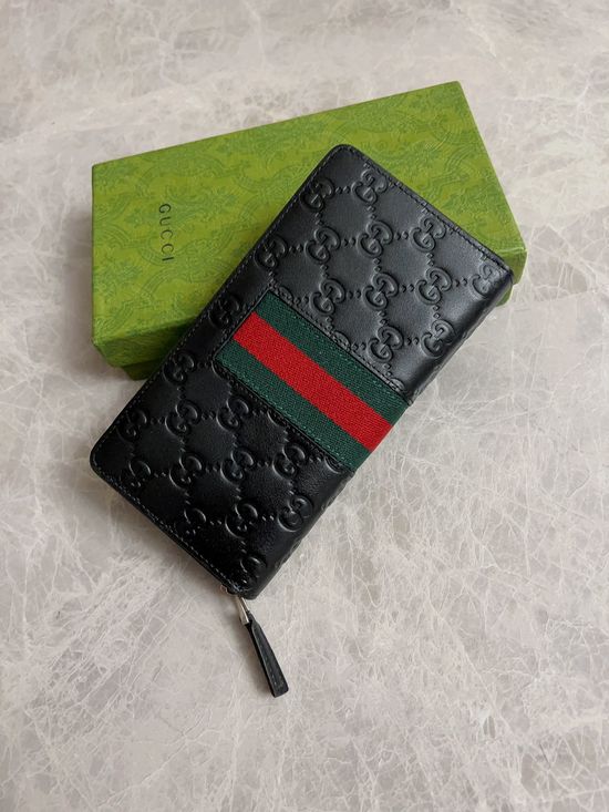 Gucci Embossed Leather Zip Wallet 408831