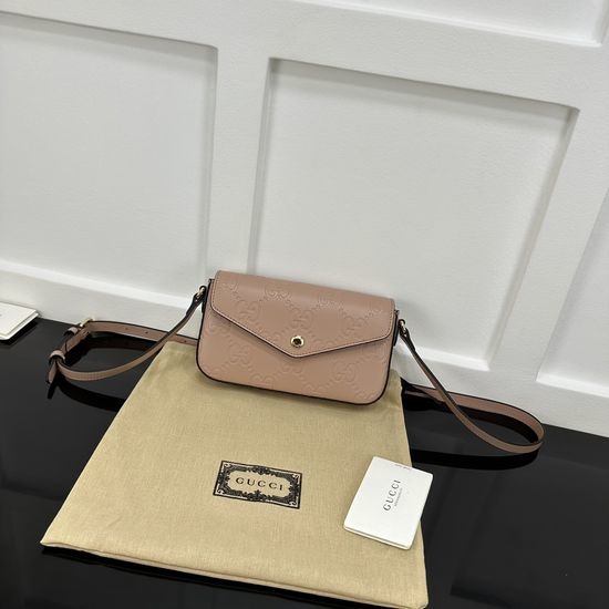 Gucci GG Embossed Mini Shoulder Bag 772794