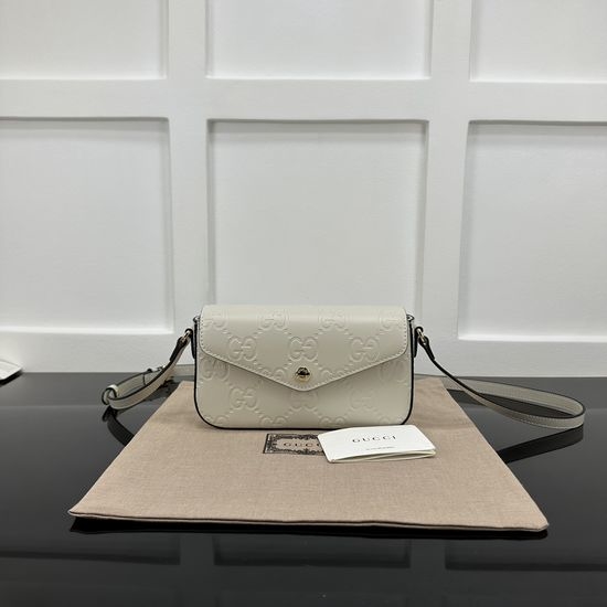 Gucci GG Embossed Mini Shoulder Bag 772794