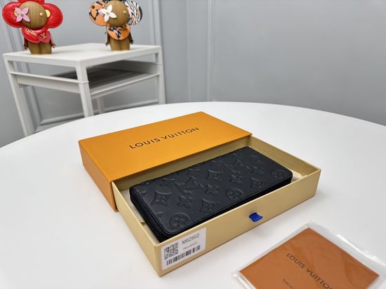 Louis Vuitton Zippy Vertical Wallet in Monogram Shadow Leather M62902