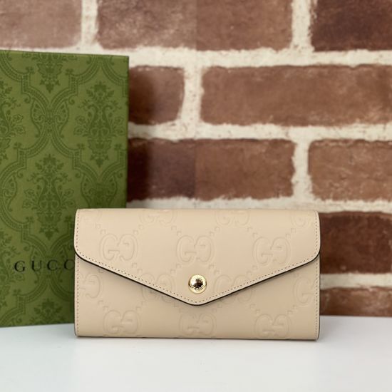 Gucci Original Leather Beige Embossed Clutch 772791