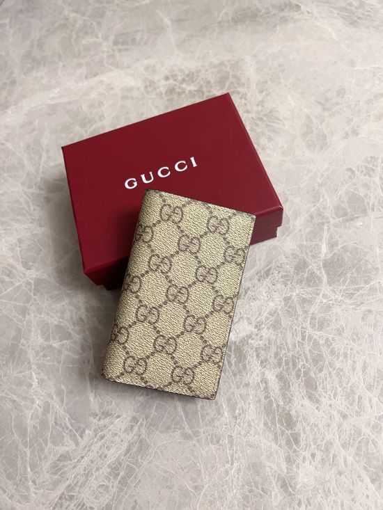 Gucci GG Emblem PVC Leather Wallet 821209