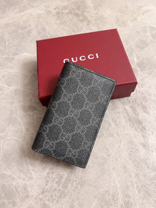 Gucci GG Emblem PVC Leather Wallet 821209