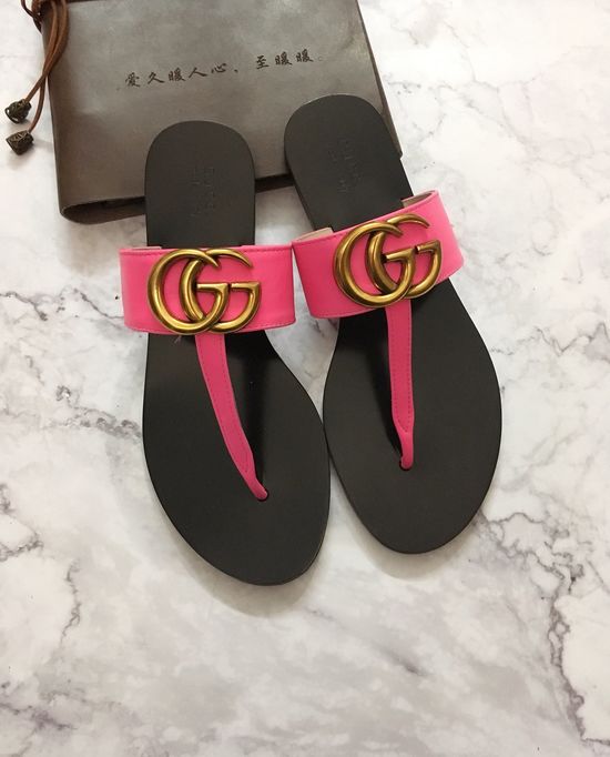 Gucci Cowhide Upper Flip Flops with Metal Decor
