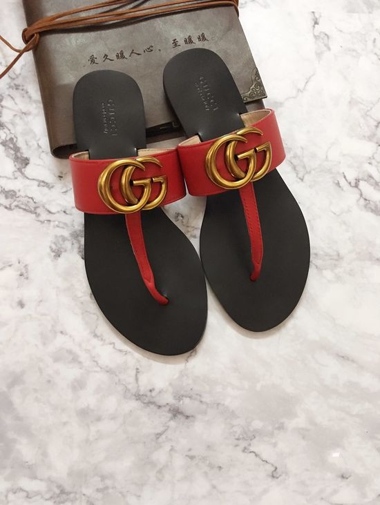Gucci Cowhide Upper Flip Flops with Metal Decor