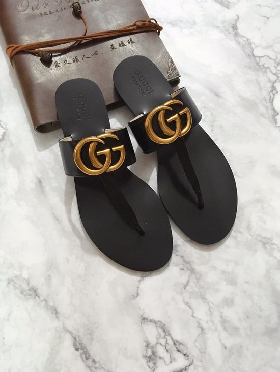 Gucci Cowhide Upper Flip Flops with Metal Decor