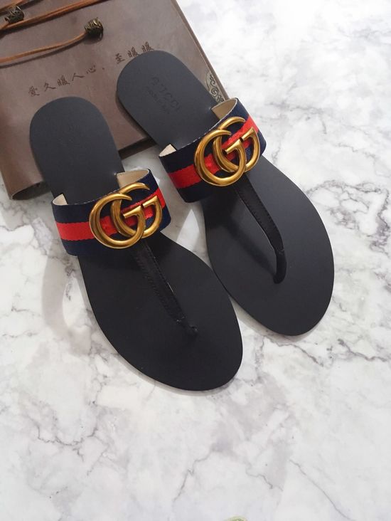 Gucci Cowhide Upper Flip Flops with Metal Decor