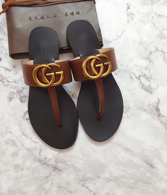 Gucci Cowhide Upper Flip Flops with Metal Decor