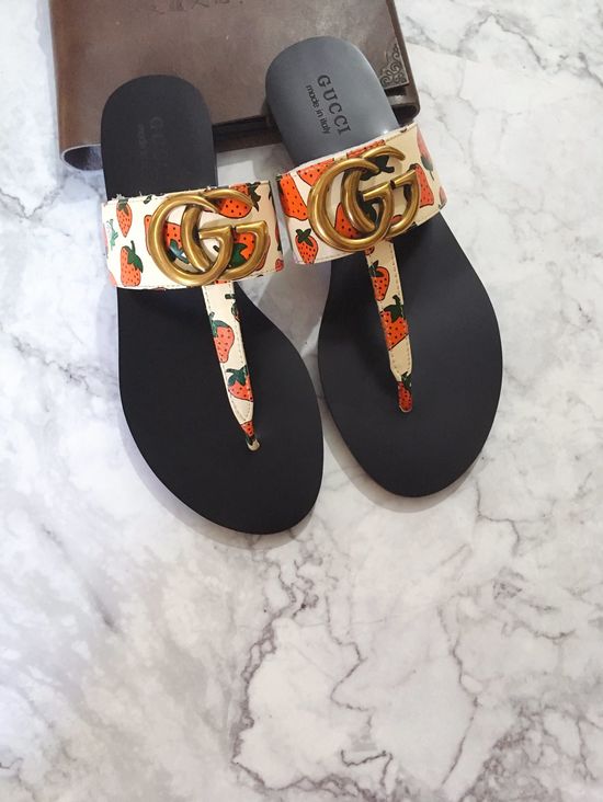 Gucci Cowhide Upper Flip Flops with Metal Decor