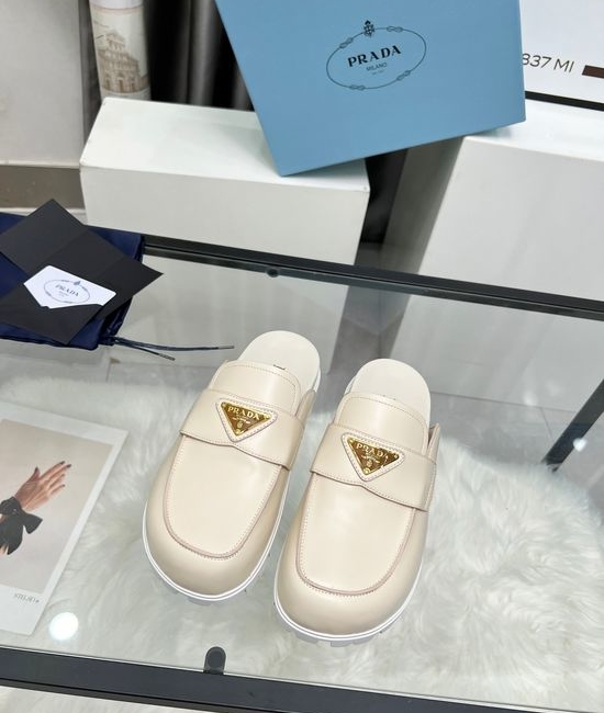 Prada Elegant Leather Casual Shoes with Embossed Logo Detail