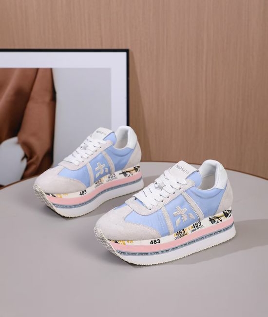 Premiata Minimalist White Casual Sneakers with Embossed Logo Detail