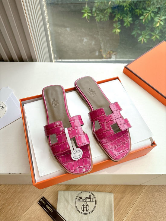 Hermes Flat Slide Sandals with Metal Lock Buckle and Leather Upper