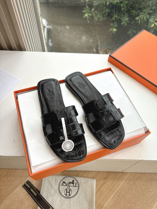 Hermes Flat Slide Sandals with Metal Lock Buckle and Leather Upper