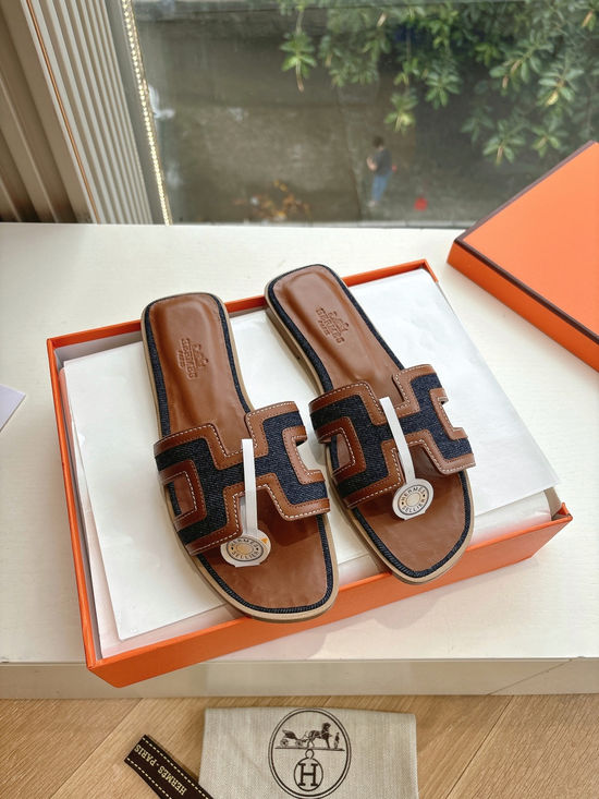 Hermes Flat Slide Sandals with Metal Lock Buckle and Leather Upper