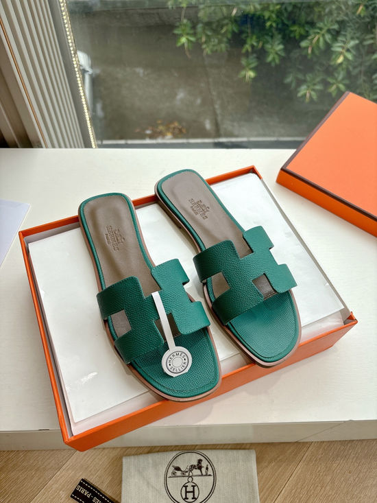 Hermes Flat Slide Sandals with Metal Lock Buckle and Leather Upper