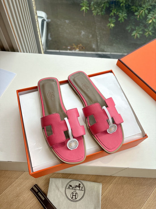 Hermes Flat Slide Sandals with Metal Lock Buckle and Leather Upper