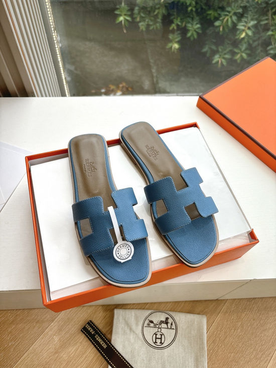 Hermes Flat Slide Sandals with Metal Lock Buckle and Leather Upper