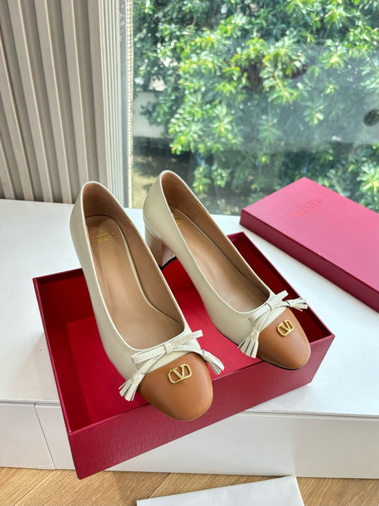 Valentino Elegant Slip-on Shoes with Smooth Lines and Height Boost