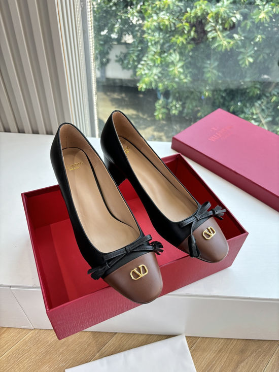 Valentino Elegant Slip-on Shoes with Smooth Lines and Height Boost