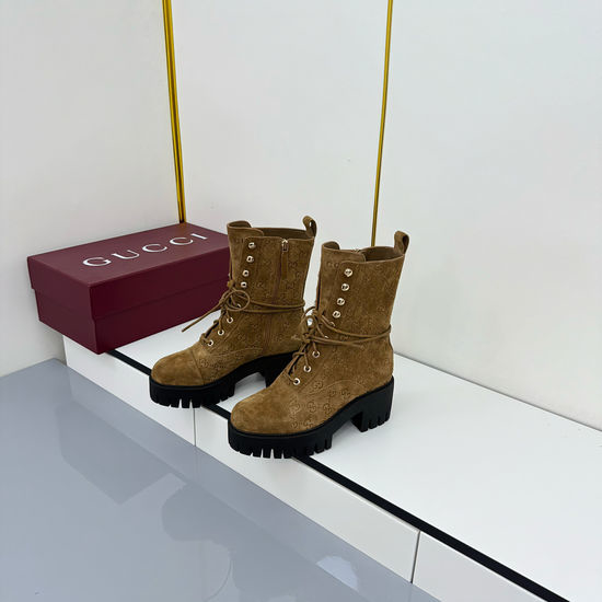 Gucci Embossed Leather Lace Up Ankle Boots With Treaded Sole