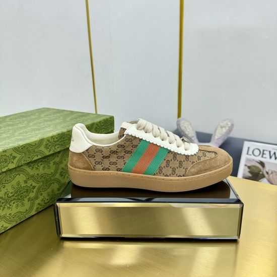 Gucci Leather Stitched Sneakers With 3D Emblem Decor