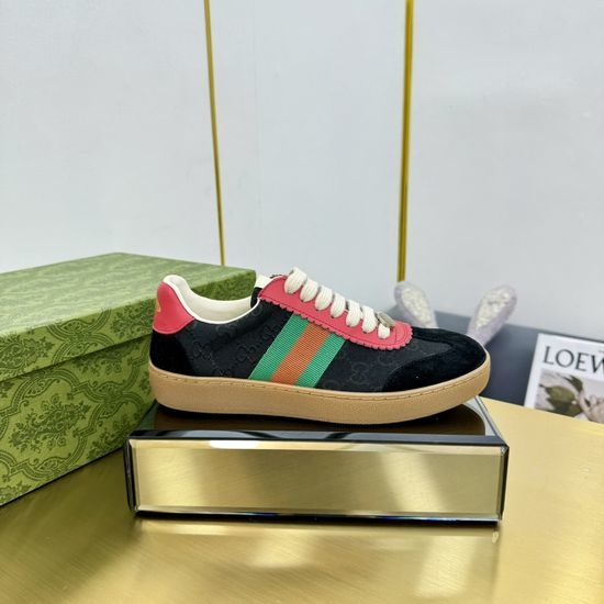 Gucci Leather Stitched Sneakers With 3D Emblem Decor