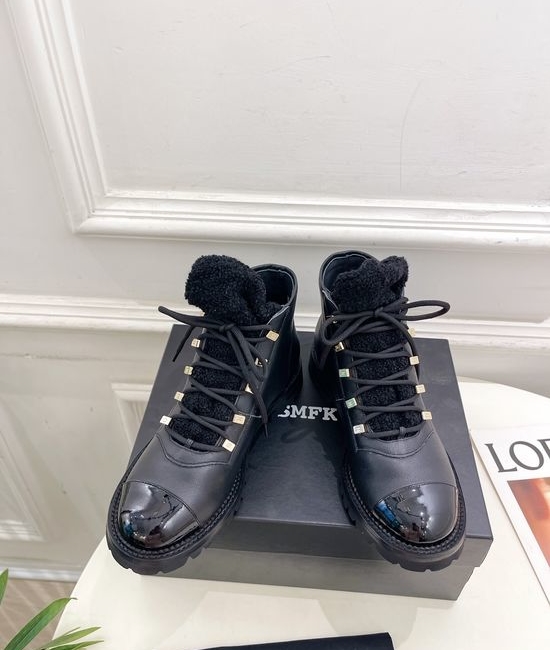 Chanel Elegant Knee-High Boots with Custom Molded Sole