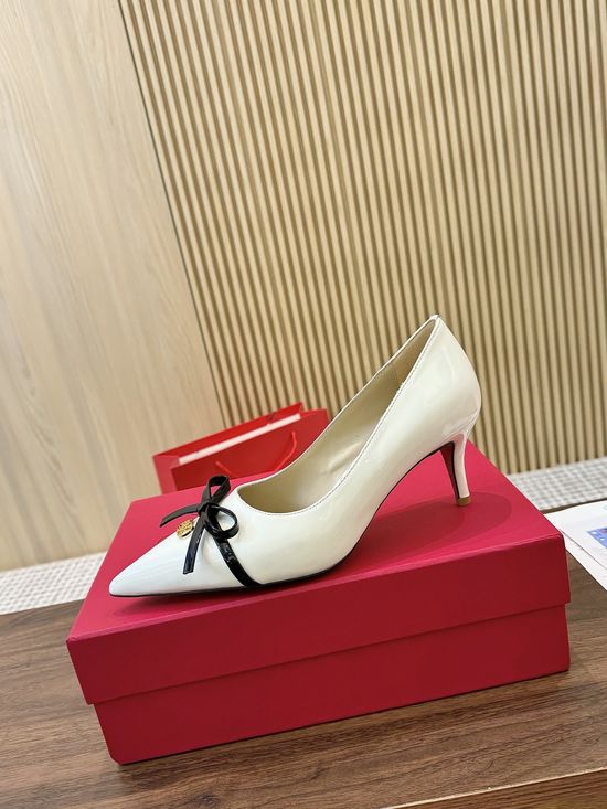 Valentino Elegant Patent Leather Pumps With Decorative Metal Buckle