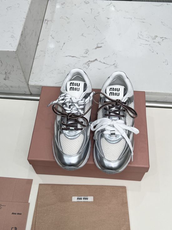 Miu Miu Vintage Distressed Chunky Sneakers with Dual Laces
