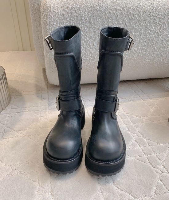 Balenciaga Distressed Leather Moto Boots with Decorative Metal Buckles