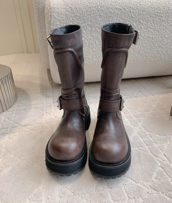 Balenciaga Distressed Leather Moto Boots with Decorative Metal Buckles