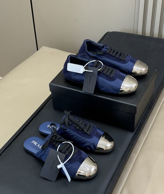Prada Lightweight Low Top Sneakers with Metal Toe Cap