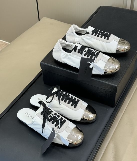 Prada Lightweight Low Top Sneakers with Metal Toe Cap