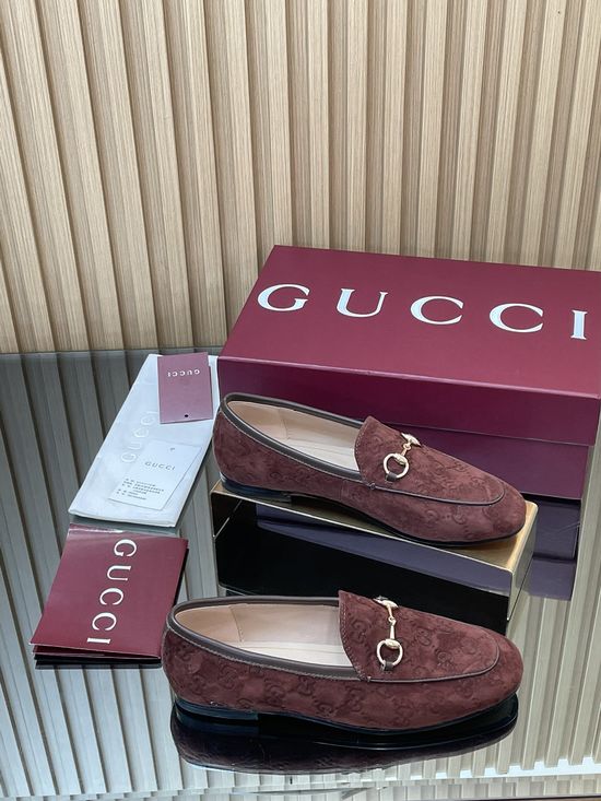 Gucci Embossed Leather Loafers with Classic Metal Buckle Accent