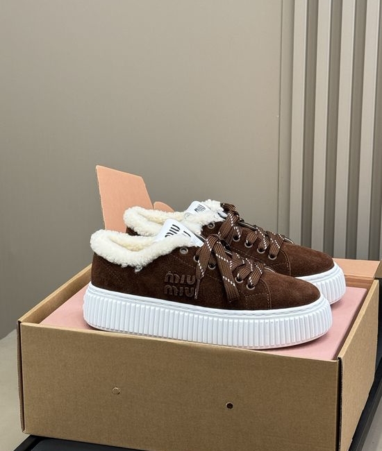 Miu Miu Luxurious Shearling-Lined Moccasin Boots