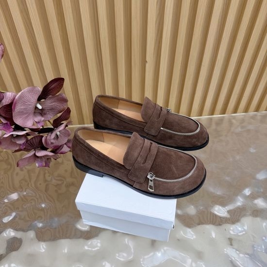 J.W.Anderson Zipper-Adorned Round-Toe Flats with Tassel Accents