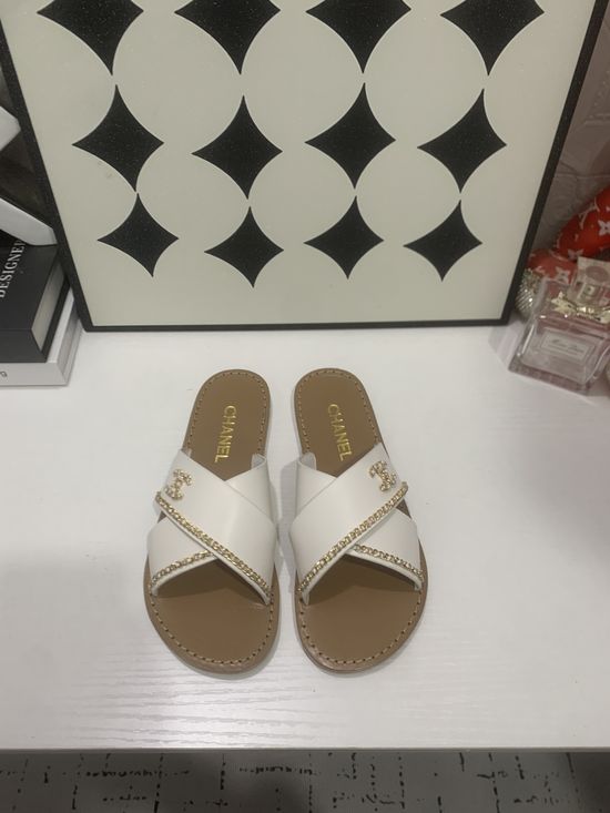 Chanel Genuine Leather Slip On Shoes with Metal Hardware
