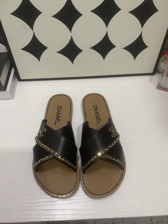 Chanel Genuine Leather Slip On Shoes with Metal Hardware
