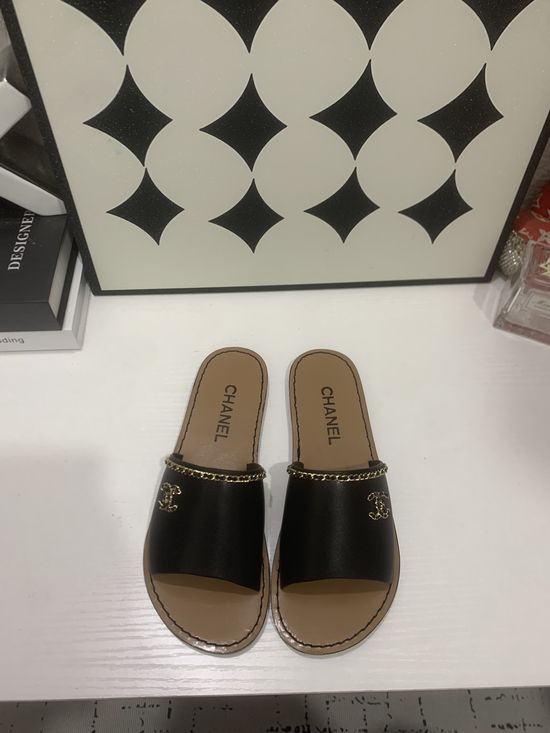 Chanel Genuine Leather Slip On Shoes with Metal Hardware