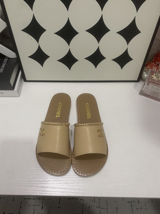Chanel Genuine Leather Slip On Shoes with Metal Hardware
