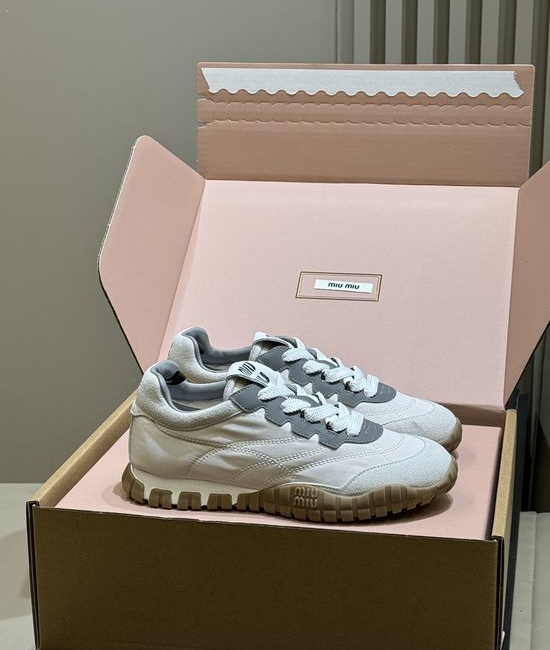 Miu Miu Retro-Inspired Training Shoes with Tire-Tread Soles
